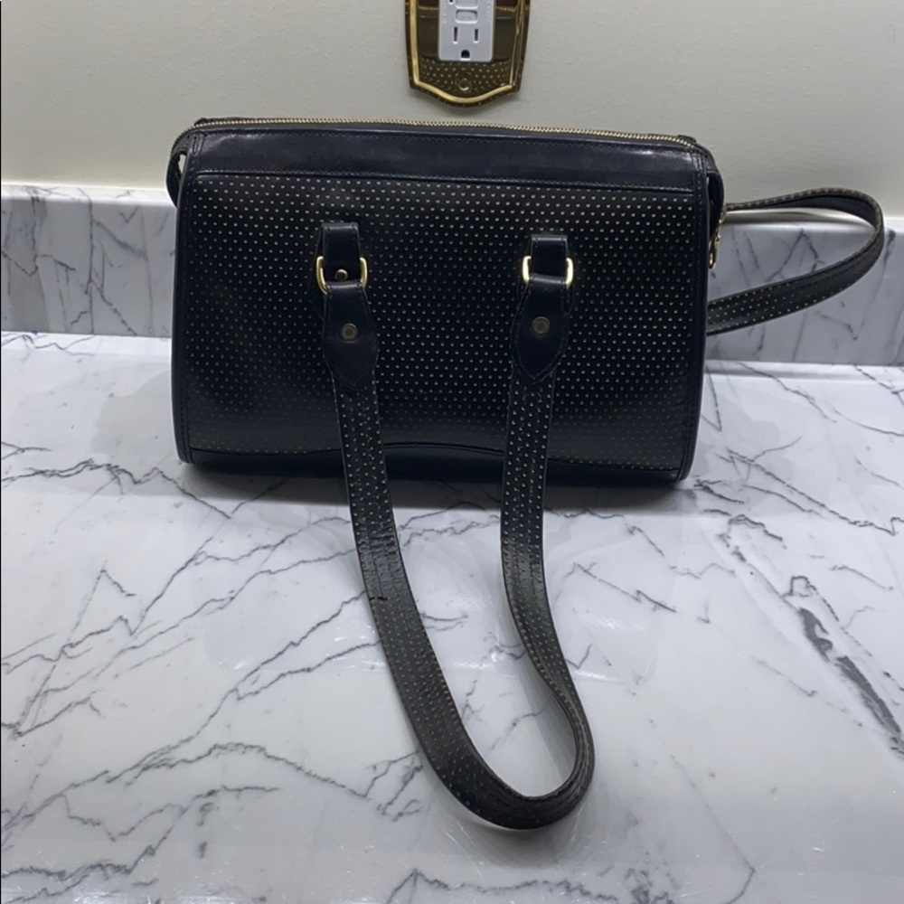 Dooney and Bourke black and yellow dot leather bag